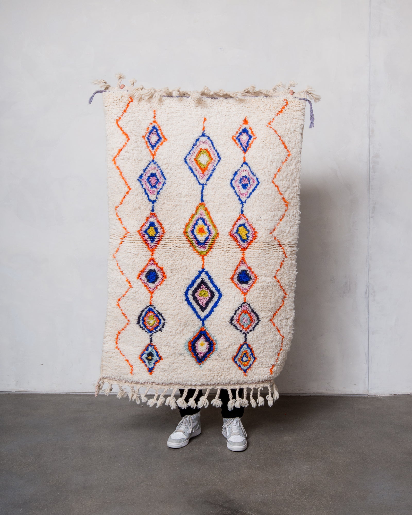 Modern, designer, handcrafted Berber rug from Morocco. Beniourain carpet with beautiful colours and patterns and fluffy wool texture.